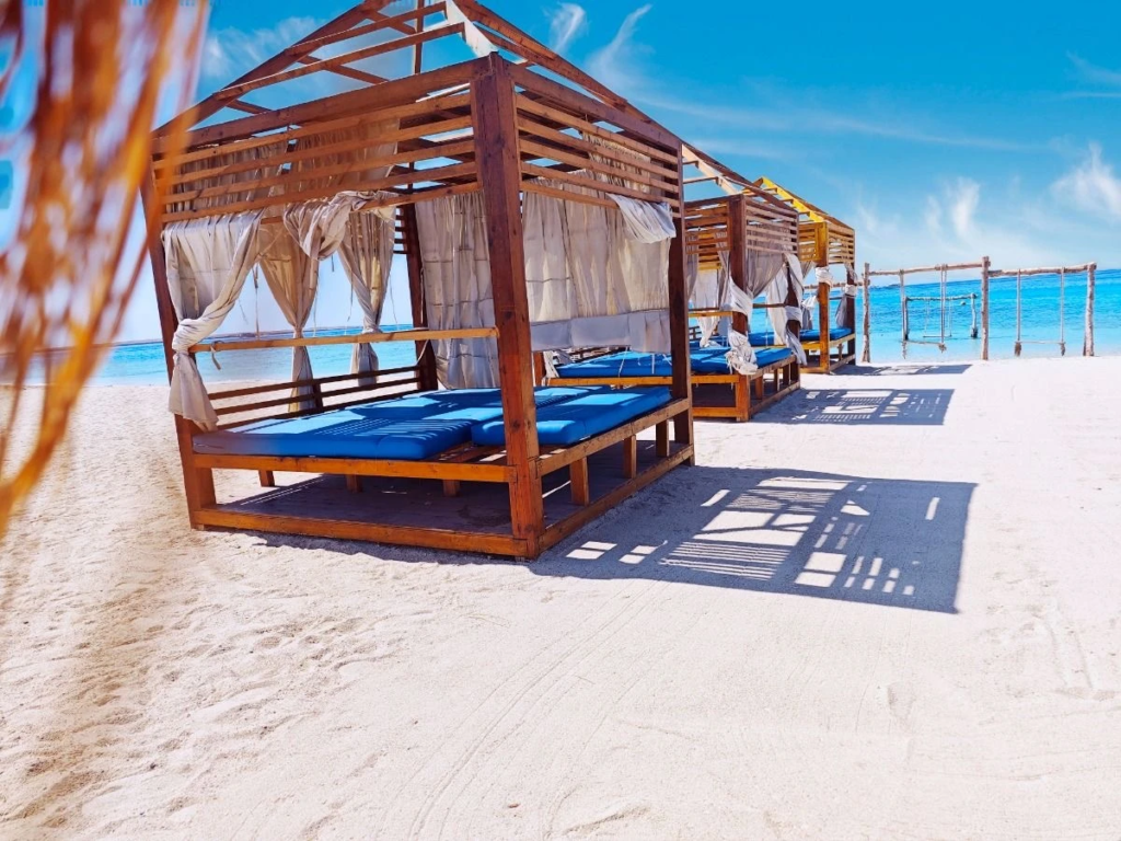 Enjoy Eden Island Hurghada with Orange Bay beach time, snorkeling, White Island views, fresh fruit, and a private Red Sea boat experience.