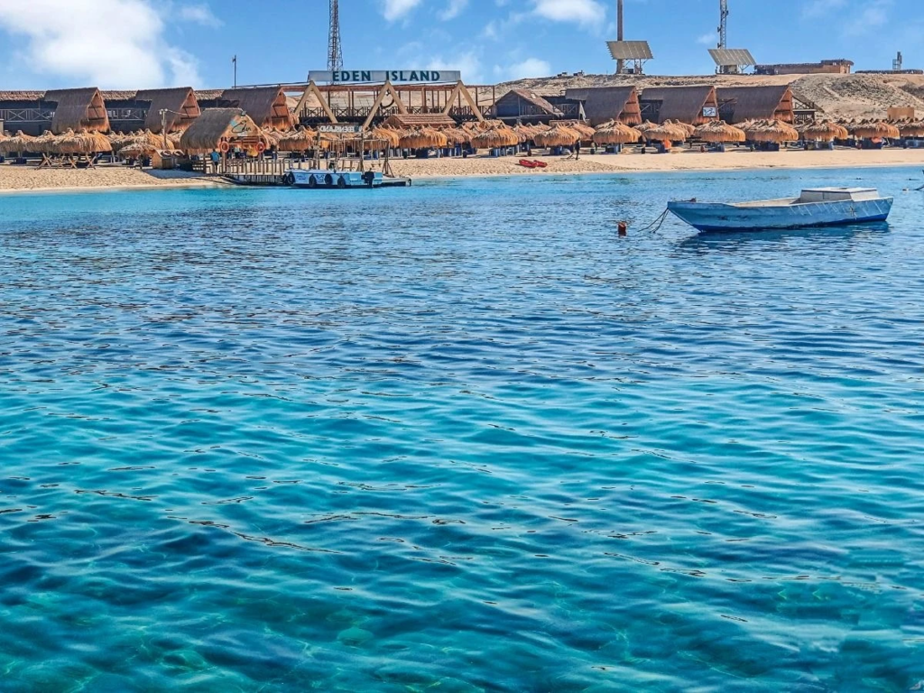 Enjoy Eden Island Hurghada with Orange Bay beach time, snorkeling, White Island views, fresh fruit, and a private Red Sea boat experience.