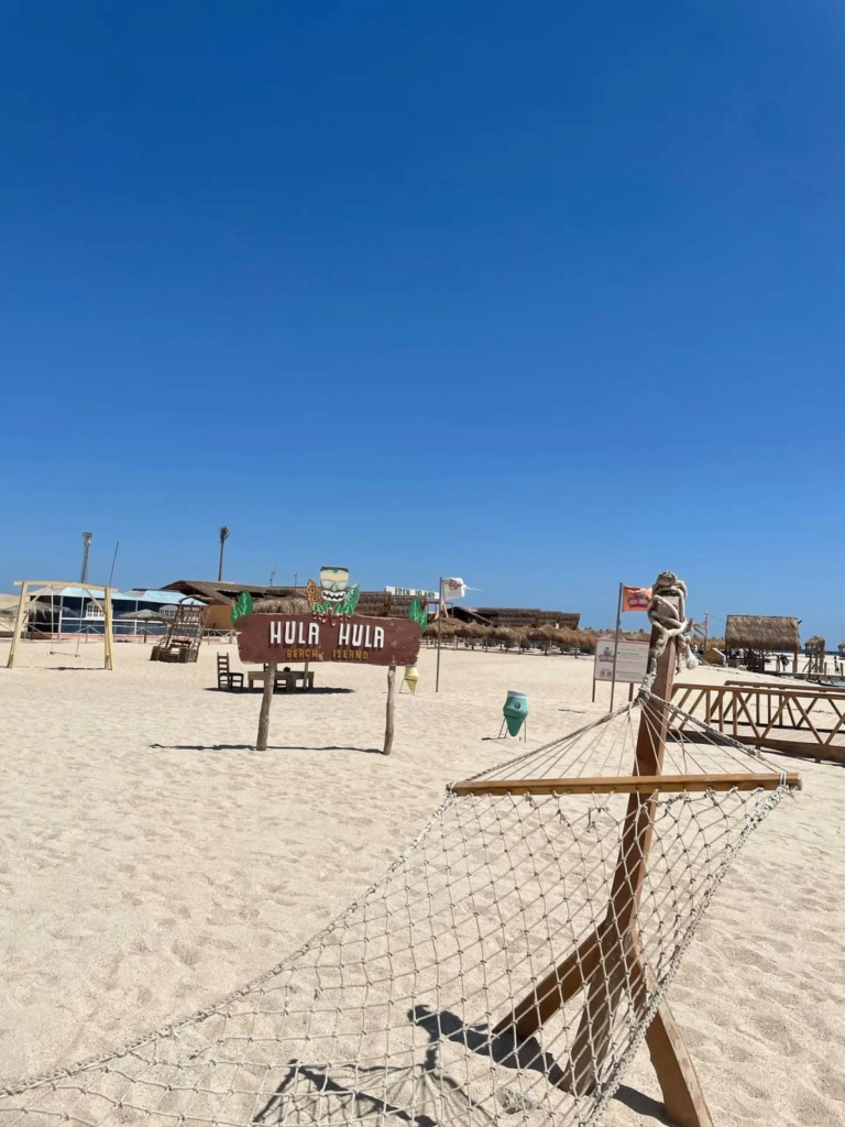 Enjoy a private Hula Hula Island trip from Hurghada with beach time, snorkeling, clear water, soft drinks, and a fun island experience.