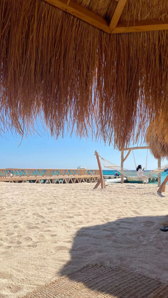 Enjoy a private Hula Hula Island trip from Hurghada with beach time, snorkeling, clear water, soft drinks, and a fun island experience.