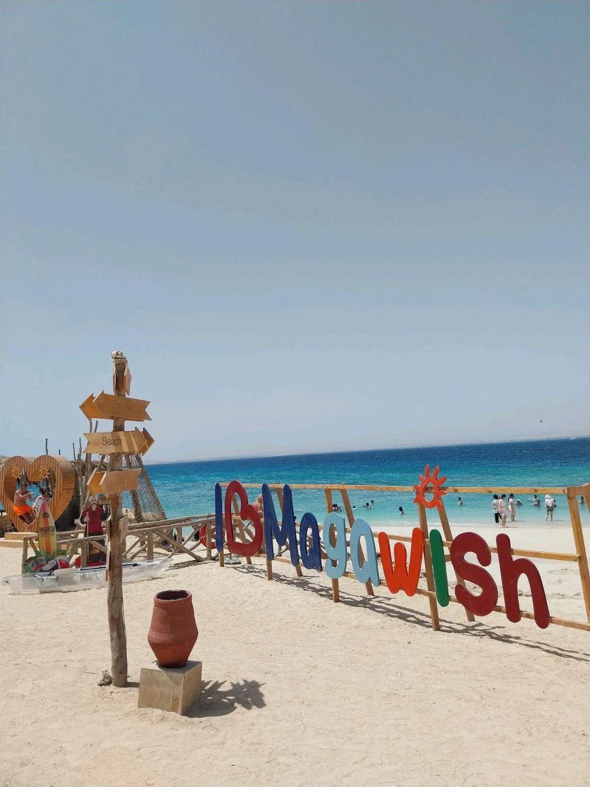 Discover Magawish Island on a private boat trip with snorkeling, white sand, calm turquoise water, fresh fruit, and a relaxing Red Sea escape.