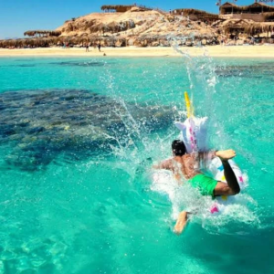 Enjoy a private Orange Bay boat trip from Hurghada with beach time, snorkeling, turquoise water, soft drinks, and a relaxed Red Sea experience.