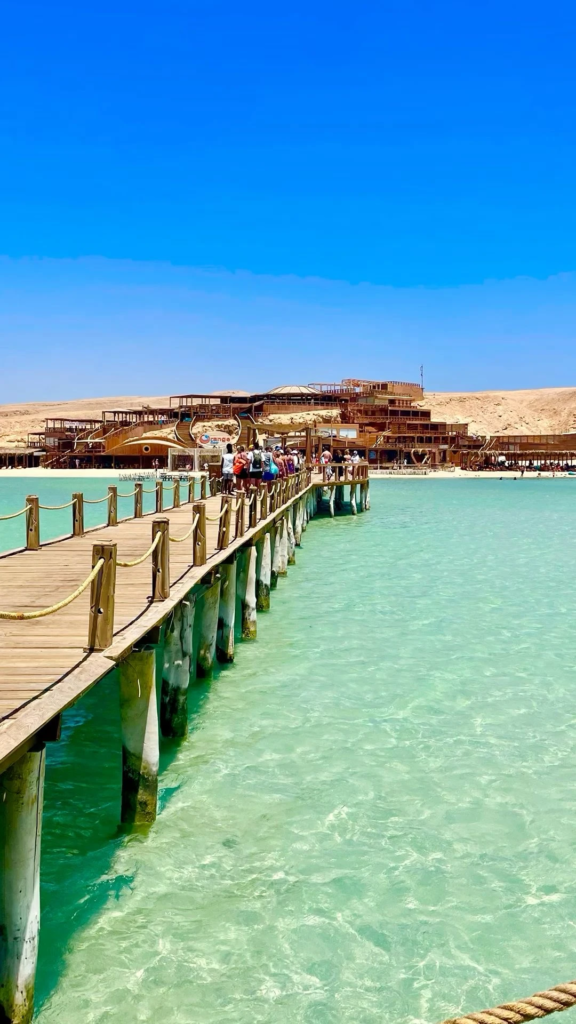 Enjoy a private Orange Bay boat trip from Hurghada with beach time, snorkeling, turquoise water, soft drinks, and a relaxed Red Sea experience.
