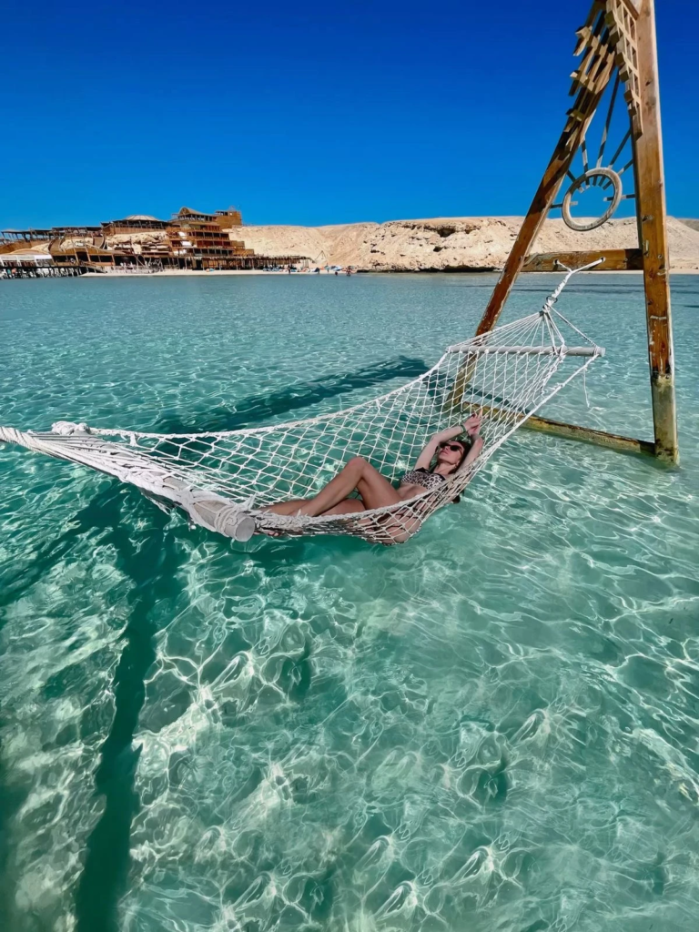 Enjoy a private Orange Bay boat trip from Hurghada with beach time, snorkeling, turquoise water, soft drinks, and a relaxed Red Sea experience.