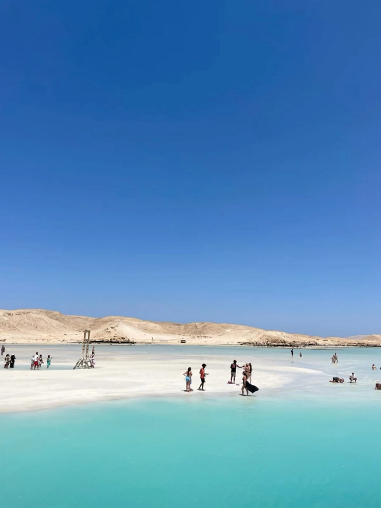 Enjoy a private Orange Bay boat trip from Hurghada with beach time, snorkeling, turquoise water, soft drinks, and a relaxed Red Sea experience.