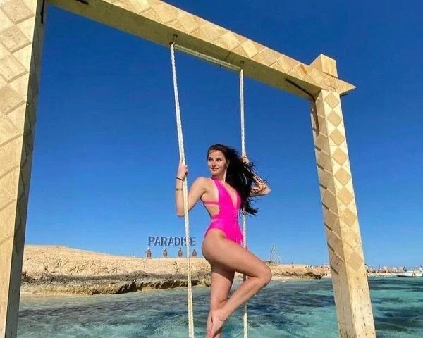 Visit Paradise Island from Hurghada on a private boat trip with snorkeling, beach relaxation, crystal-clear water, and beautiful Red Sea views.