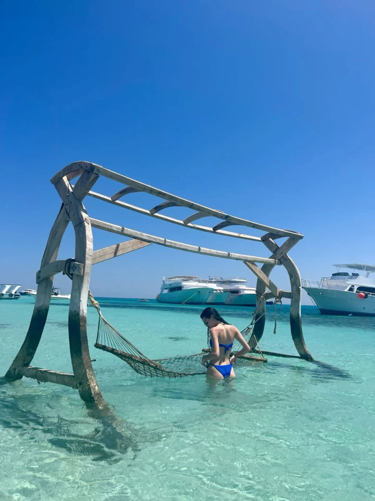 Visit Paradise Island from Hurghada on a private boat trip with snorkeling, beach relaxation, crystal-clear water, and beautiful Red Sea views.