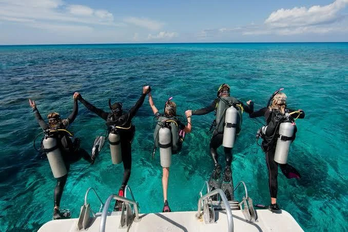 Experience scuba diving in Hurghada with professional guidance, diving equipment, colorful coral reefs, tropical fish, and beautiful Red Sea underwater views.