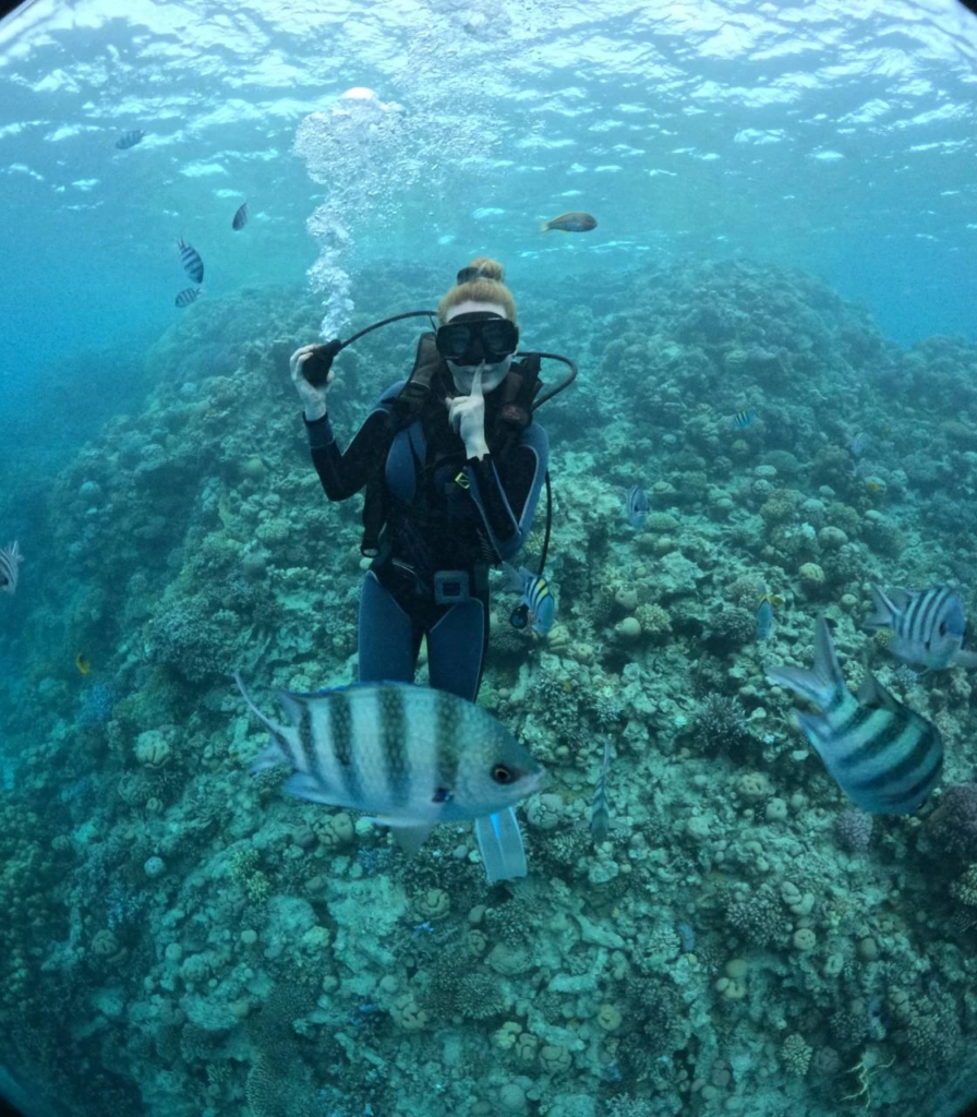 Experience scuba diving in Hurghada with professional guidance, diving equipment, colorful coral reefs, tropical fish, and beautiful Red Sea underwater views.
