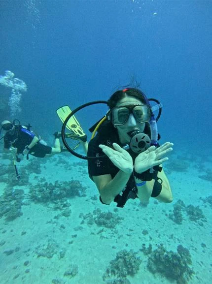 Experience scuba diving in Hurghada with professional guidance, diving equipment, colorful coral reefs, tropical fish, and beautiful Red Sea underwater views.