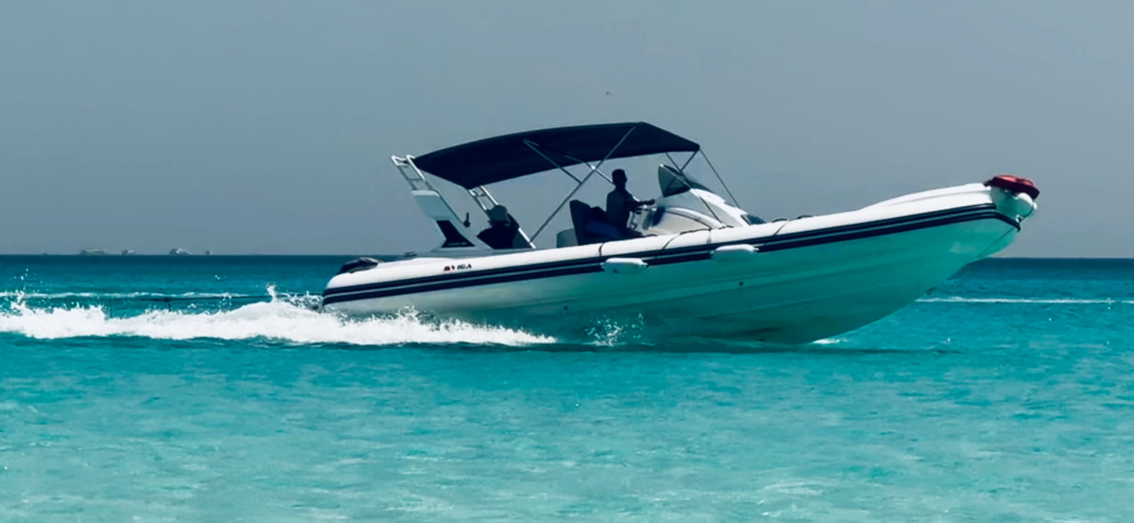 Enjoy a private 4-hour speed boat trip in Hurghada with snorkeling, clear Red Sea water, soft drinks, fresh fruit, and a flexible private experience.
